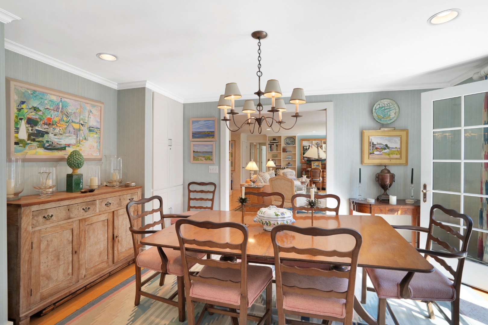 19 Kitts Field Circle Edgartown, MA 02539 - Photo 22 of 69 a view of a dining room with furniture and chandelier