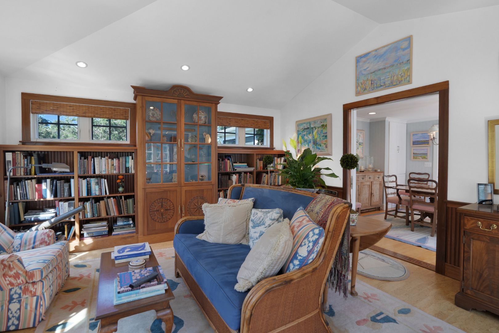 19 Kitts Field Circle Edgartown, MA 02539 - Photo 24 of 69 a living room with furniture and a book shelf