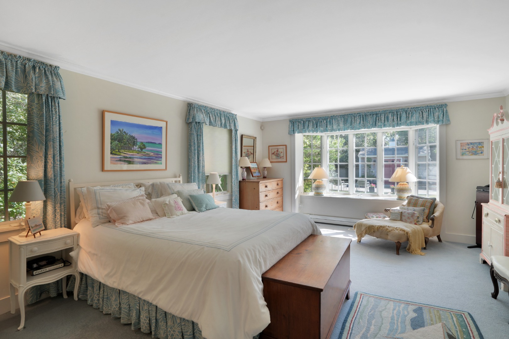 19 Kitts Field Circle Edgartown, MA 02539 - Photo 28 of 69 a bedroom with a large bed and a large window