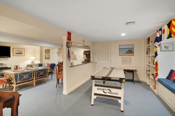 a bed room with a bed and a view of bedroom