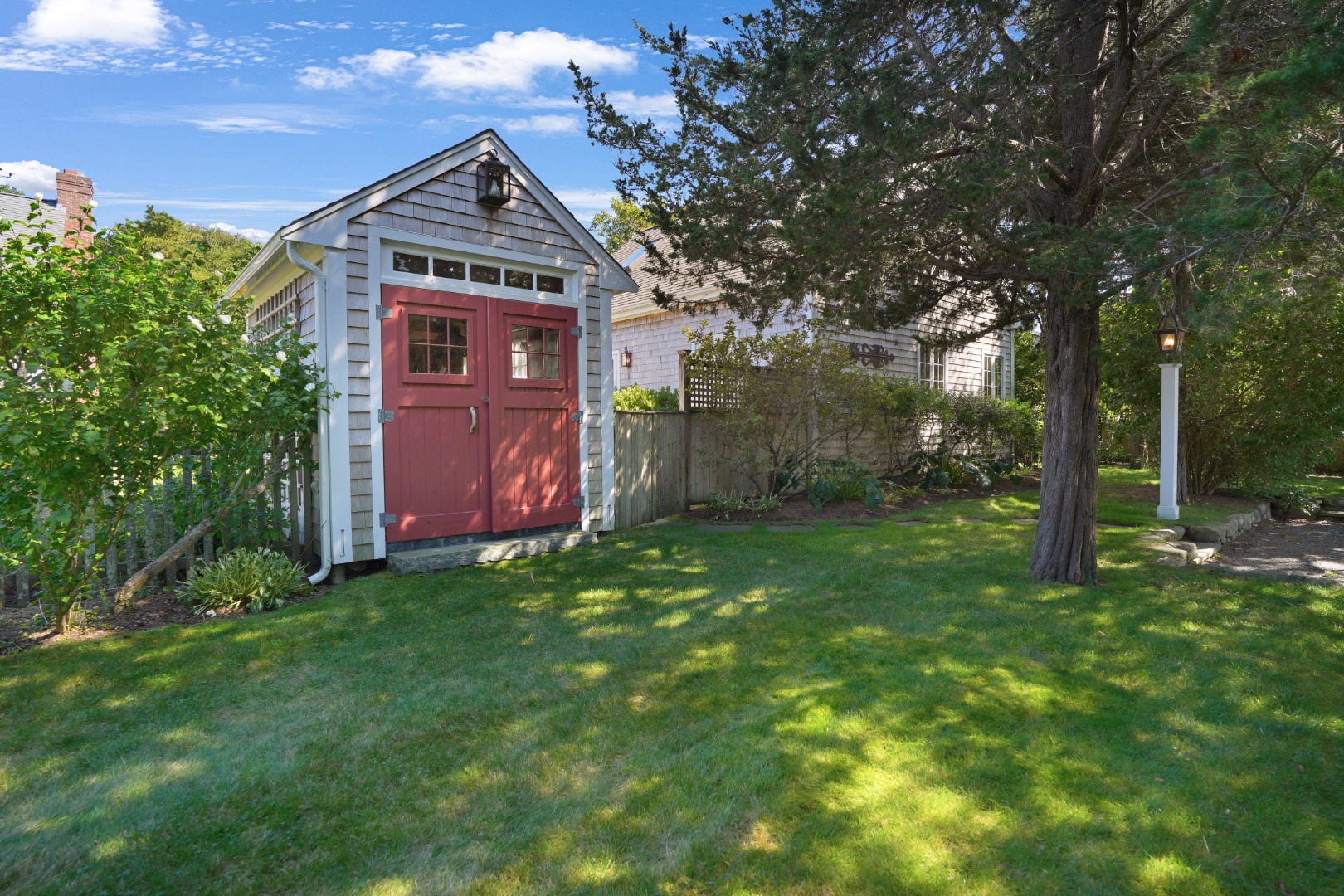 19 Kitts Field Circle Edgartown, MA 02539 - Photo 42 of 69 a front view of a house with garden