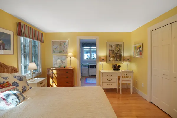 an aerial view of a house with a yard and garden