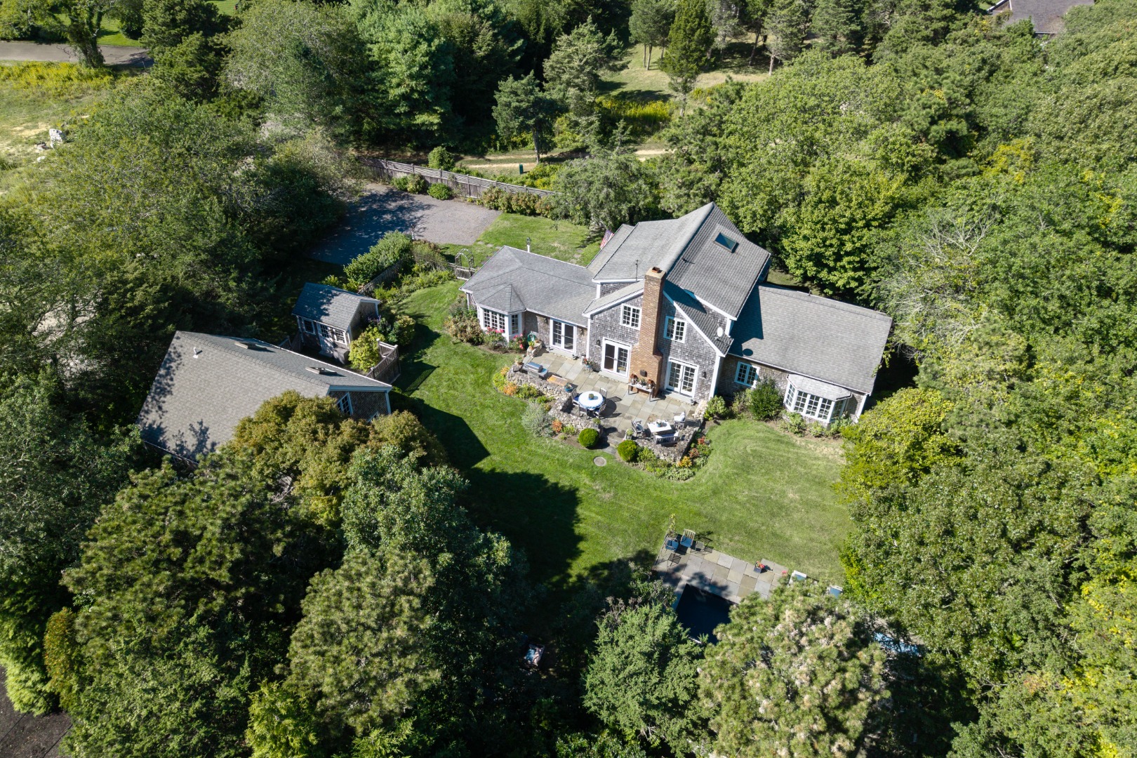 19 Kitts Field Circle Edgartown, MA 02539 - Photo 62 of 69 an aerial view of residential house with outdoor space and trees all around