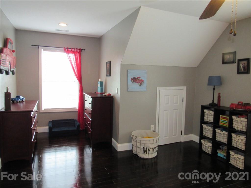 66 High Acres Road Waynesville, NC 28786 - Photo 26 of 41 a workspace with furniture window and wooden floor