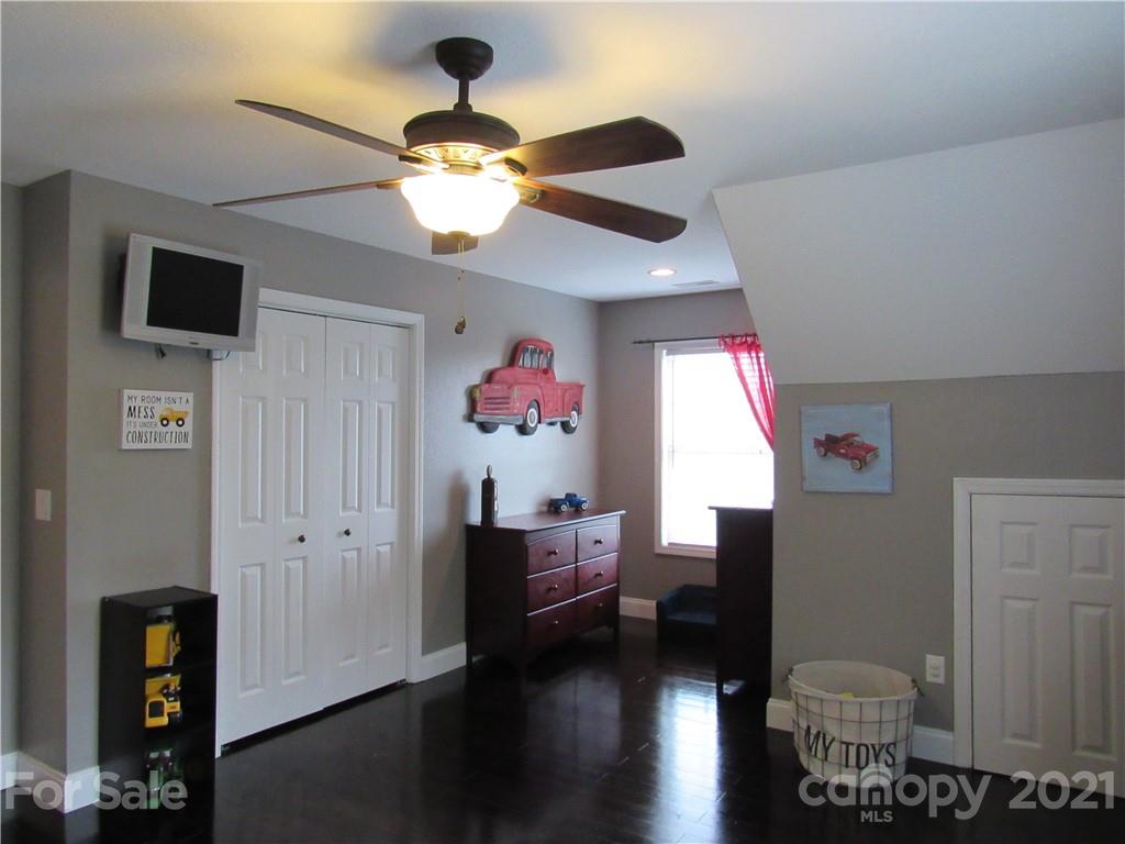 66 High Acres Road Waynesville, NC 28786 - Photo 28 of 41 a living room with furniture and a window