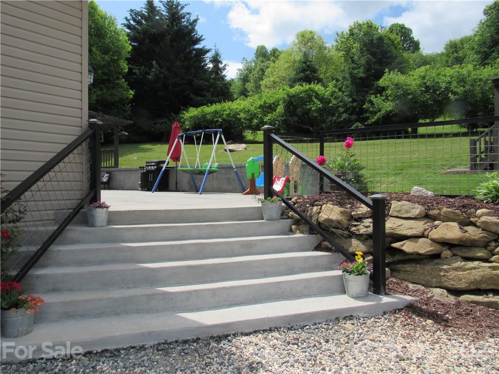 66 High Acres Road Waynesville, NC 28786 - Photo 36 of 41 a view of stairs and garden