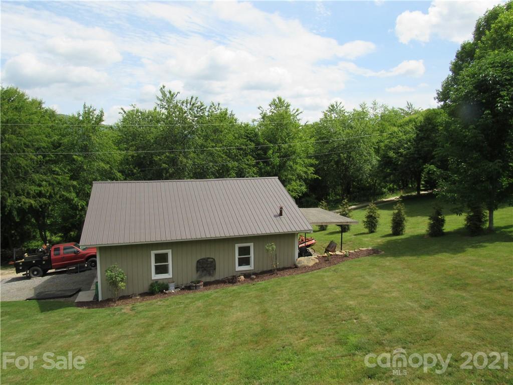 66 High Acres Road Waynesville, NC 28786 - Photo 37 of 41 an aerial view of a house