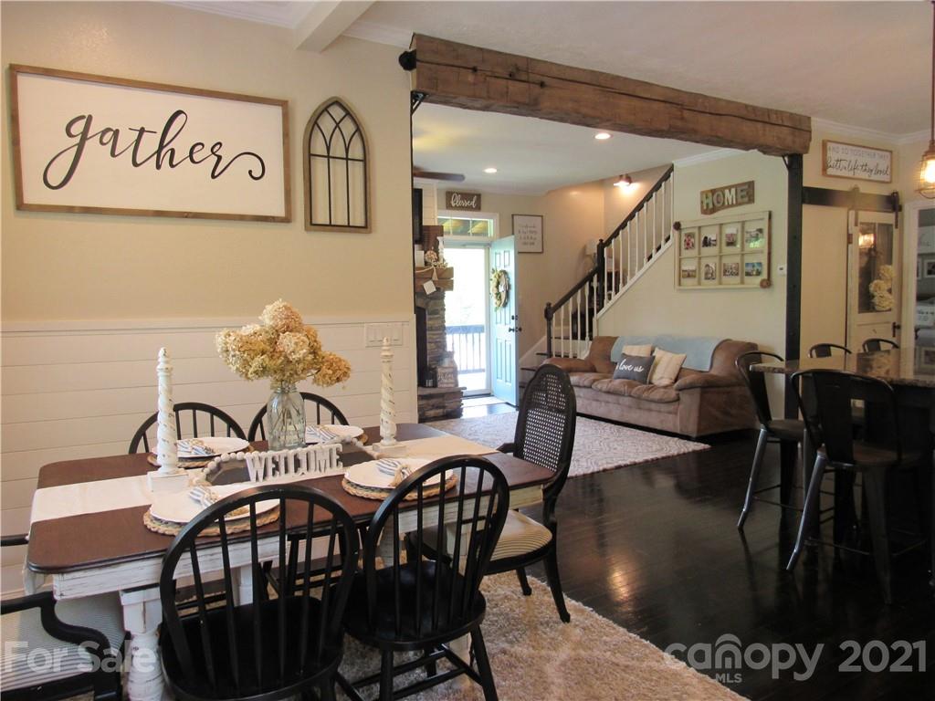 66 High Acres Road Waynesville, NC 28786 - Photo 8 of 41 a view of a dining room with furniture