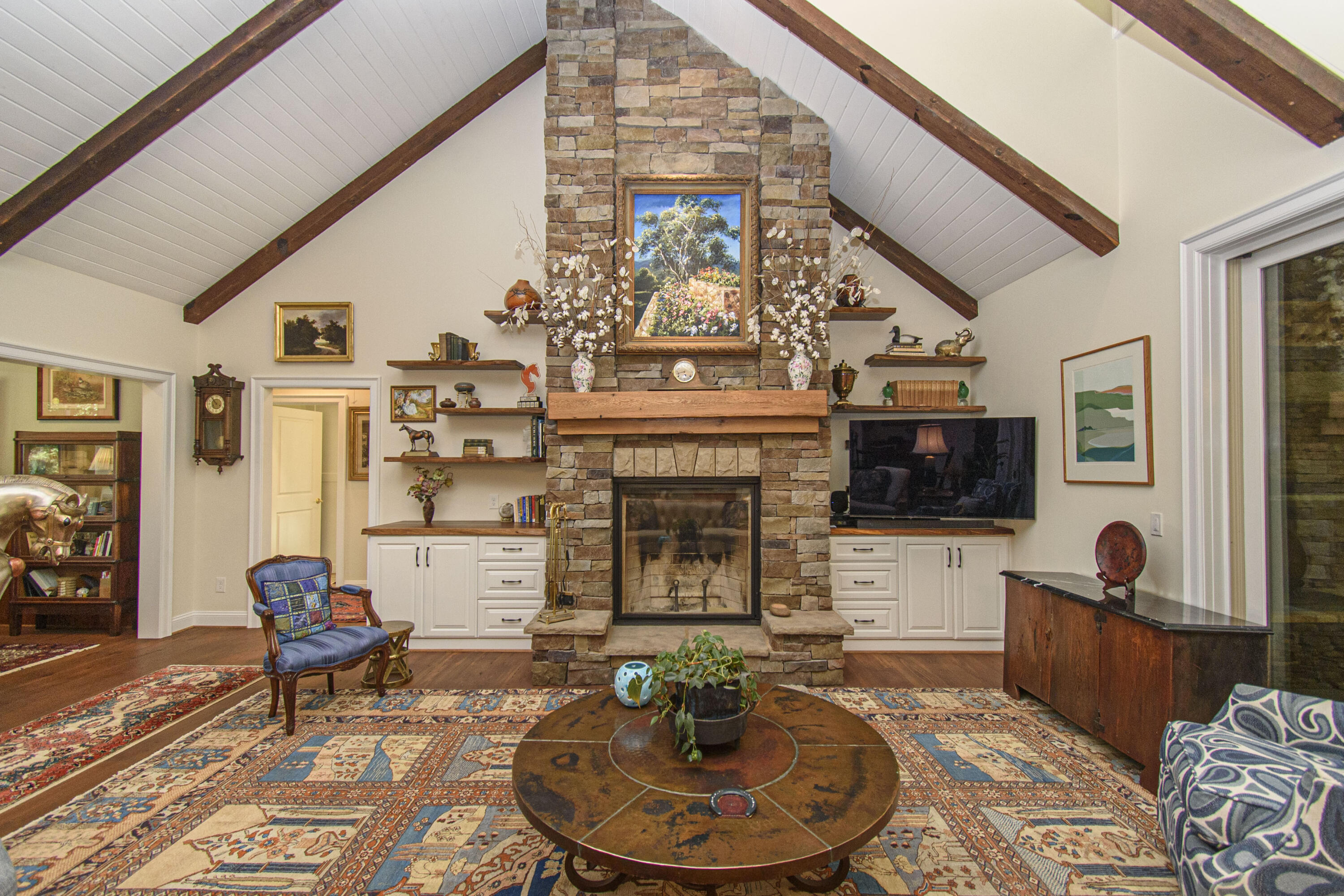 5600 Mt Tabor Road Blacksburg, VA 24060 - Photo 11 of 99 a living room with furniture a fireplace and a flat screen tv