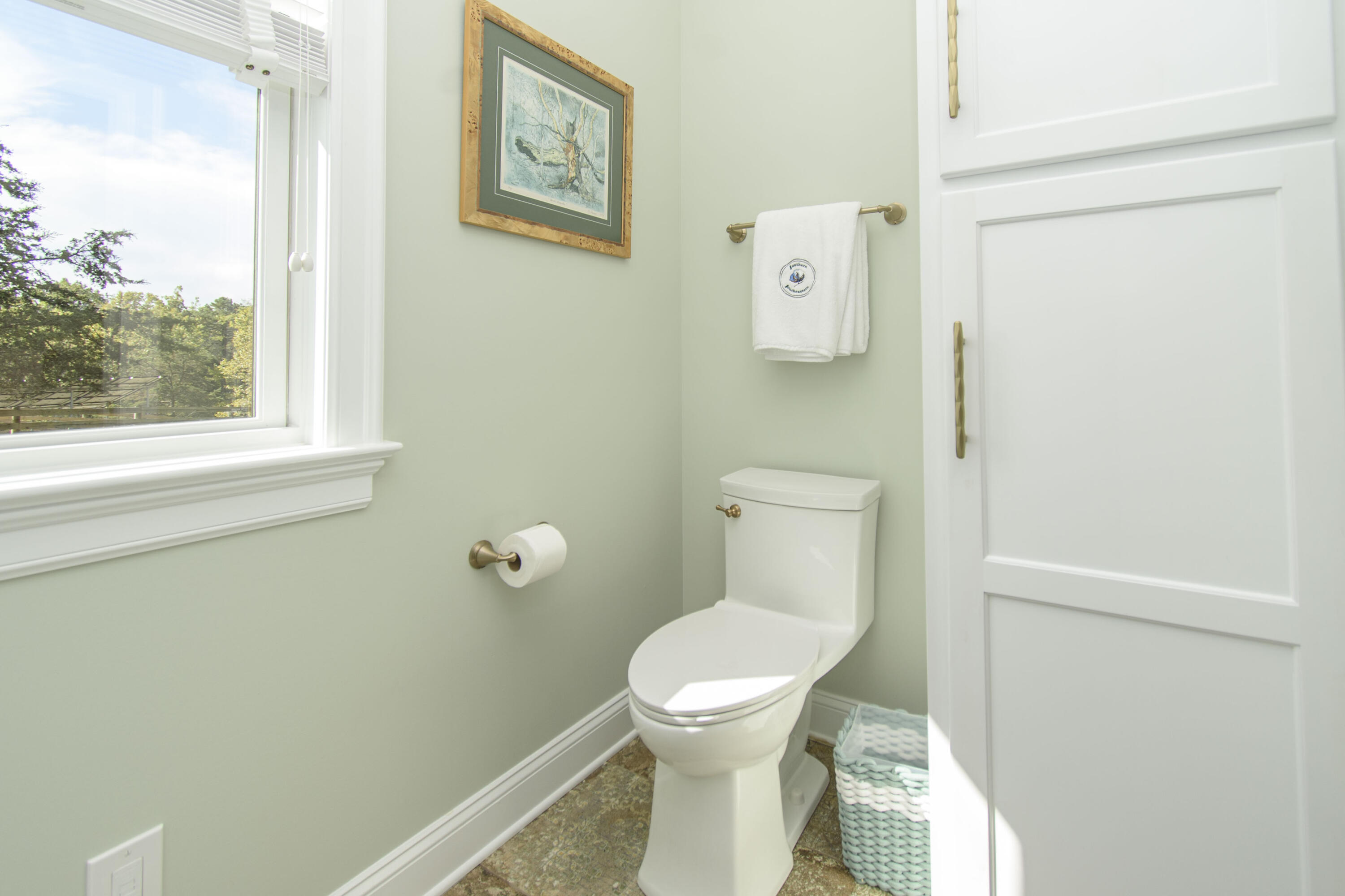 5600 Mt Tabor Road Blacksburg, VA 24060 - Photo 47 of 99 a white toilet sitting next to a bathroom sink