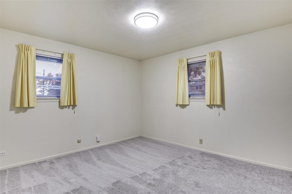 802 Cardinal Road Mansfield, TX 76063 - Photo 23 of 31 an empty room with windows