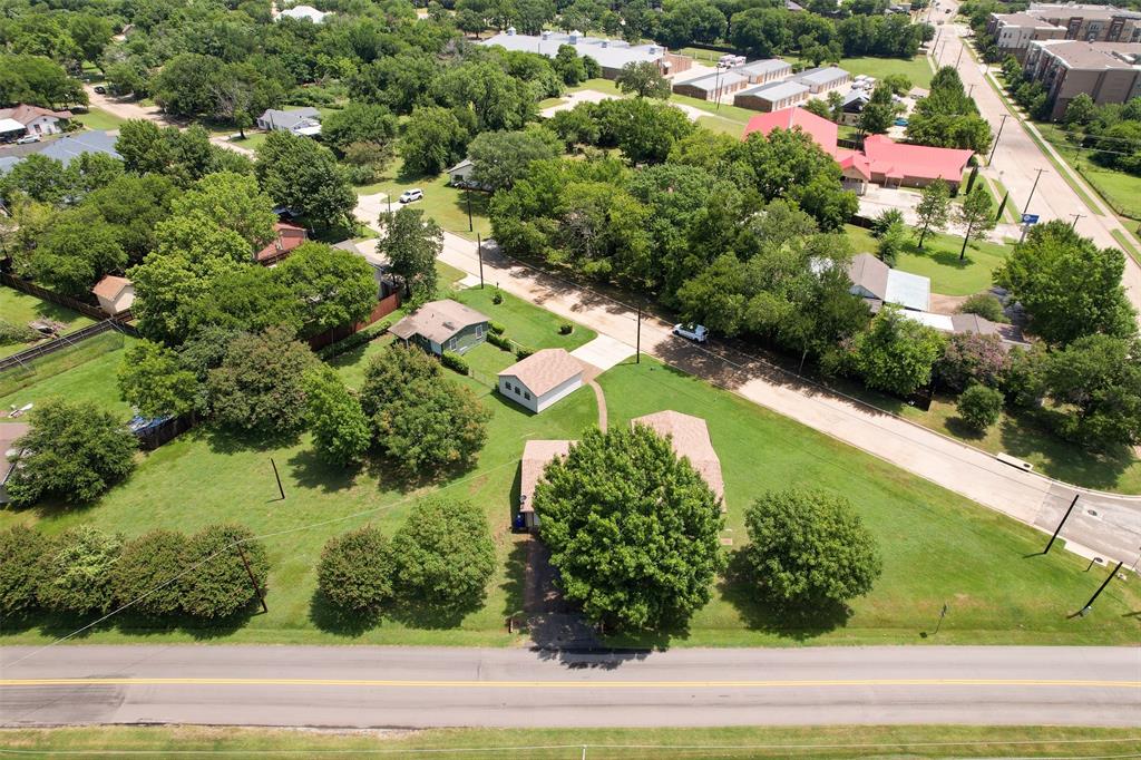 802 Cardinal Road Mansfield, TX 76063 - Photo 30 of 31 an aerial view of residential houses with outdoor space and trees