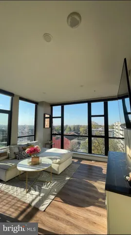 a living room with couch and a table