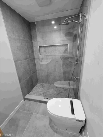 a bathroom with a bathtub and shower