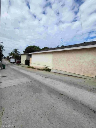 a view of a car garage with a car parked