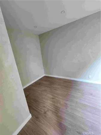 a view of a big room with wooden floor