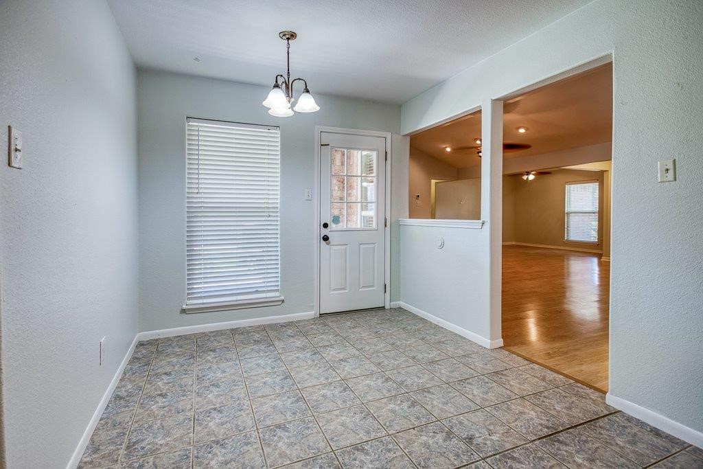 113 Seco Drive Portland, TX 78374 - Photo 18 of 37 an empty room with windows and entrance