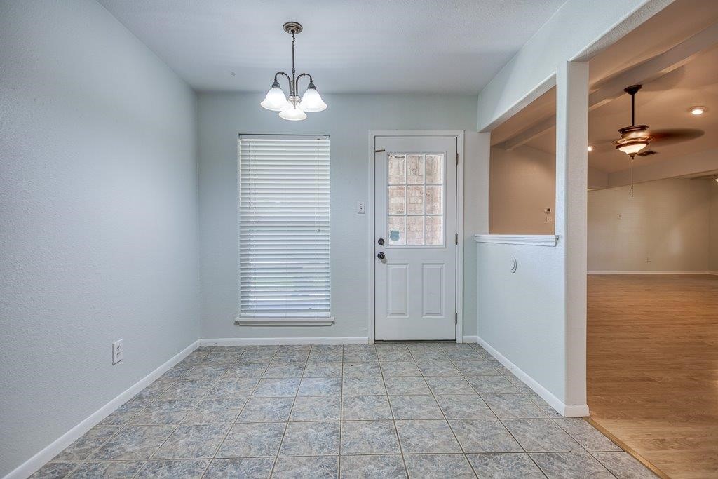 113 Seco Drive Portland, TX 78374 - Photo 19 of 37 an empty room with windows and entrance