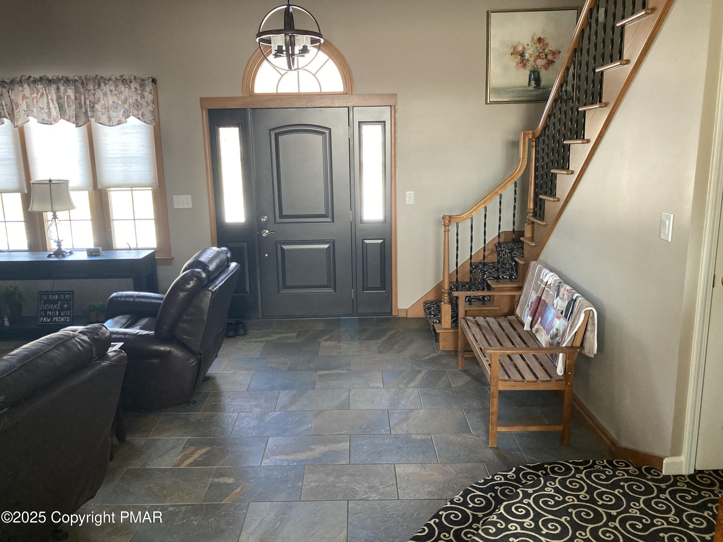 534 Sandt Road Pen Argyl, PA 18072 - Photo 14 of 77 a living room with furniture and a fireplace