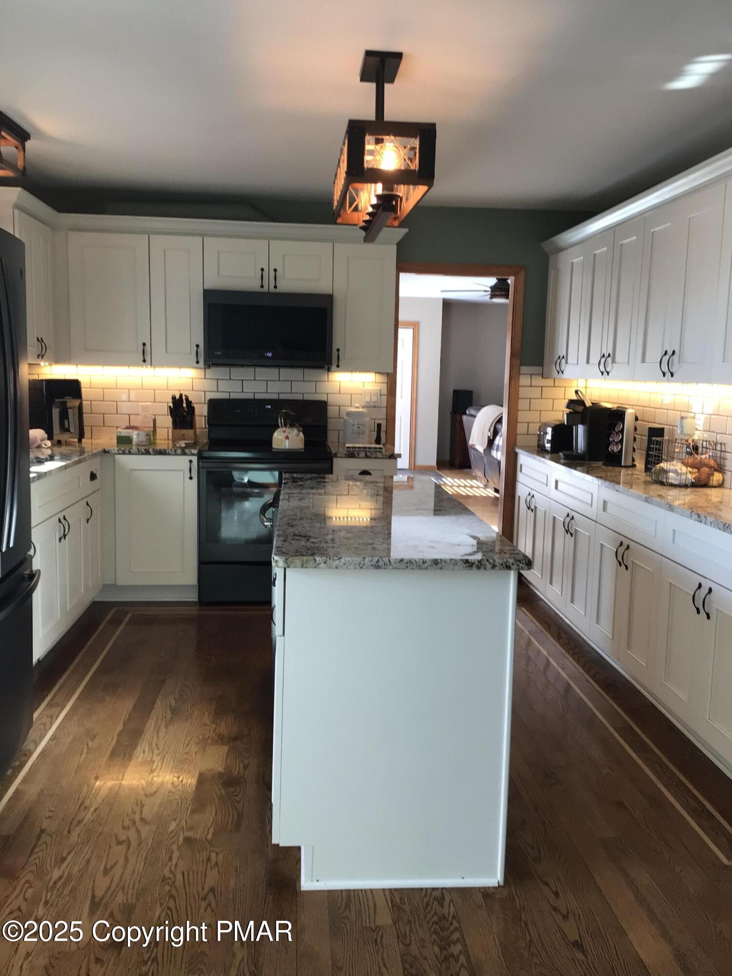 534 Sandt Road Pen Argyl, PA 18072 - Photo 20 of 77 a kitchen with a sink cabinets and stainless steel appliances
