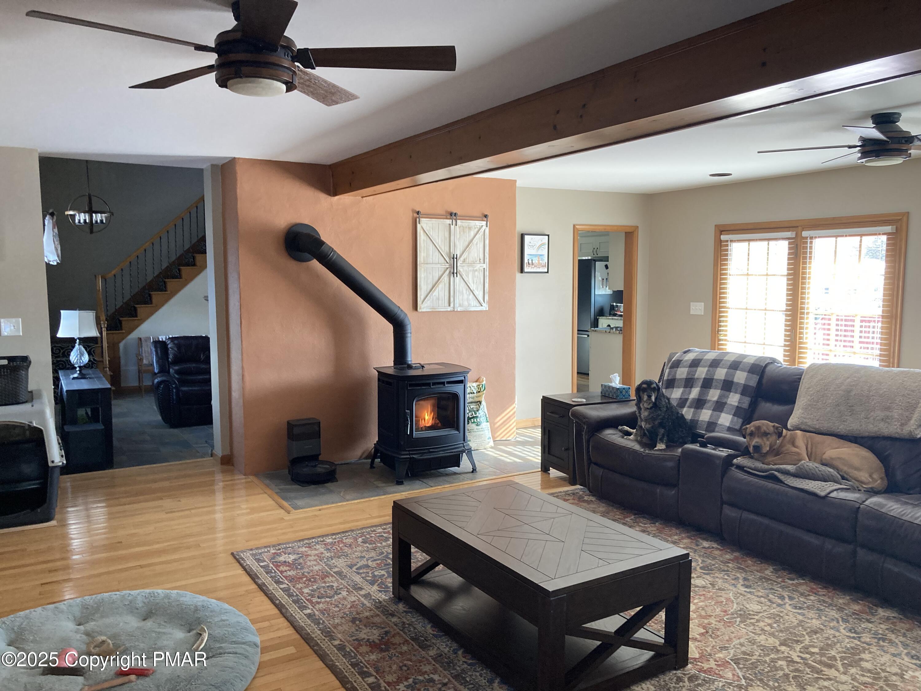 534 Sandt Road Pen Argyl, PA 18072 - Photo 27 of 77 a living room with furniture and a fireplace