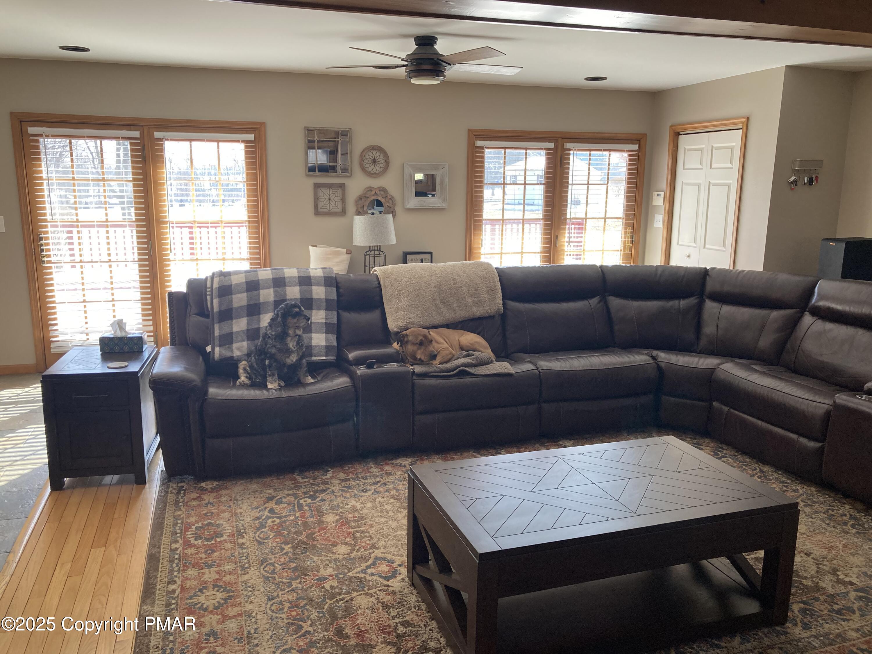 534 Sandt Road Pen Argyl, PA 18072 - Photo 29 of 77 a living room with furniture and a window