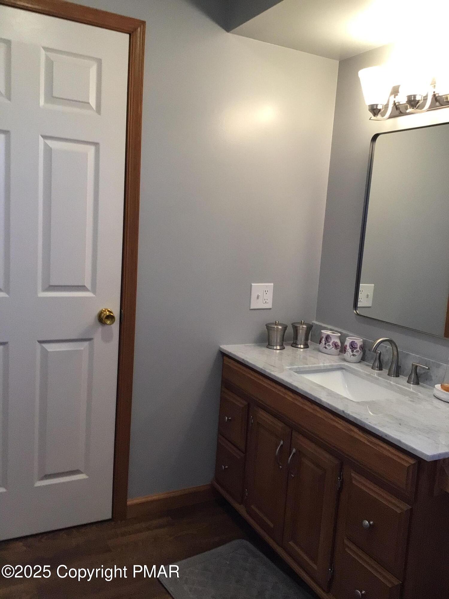 534 Sandt Road Pen Argyl, PA 18072 - Photo 51 of 77 a bathroom with a sink and a mirror