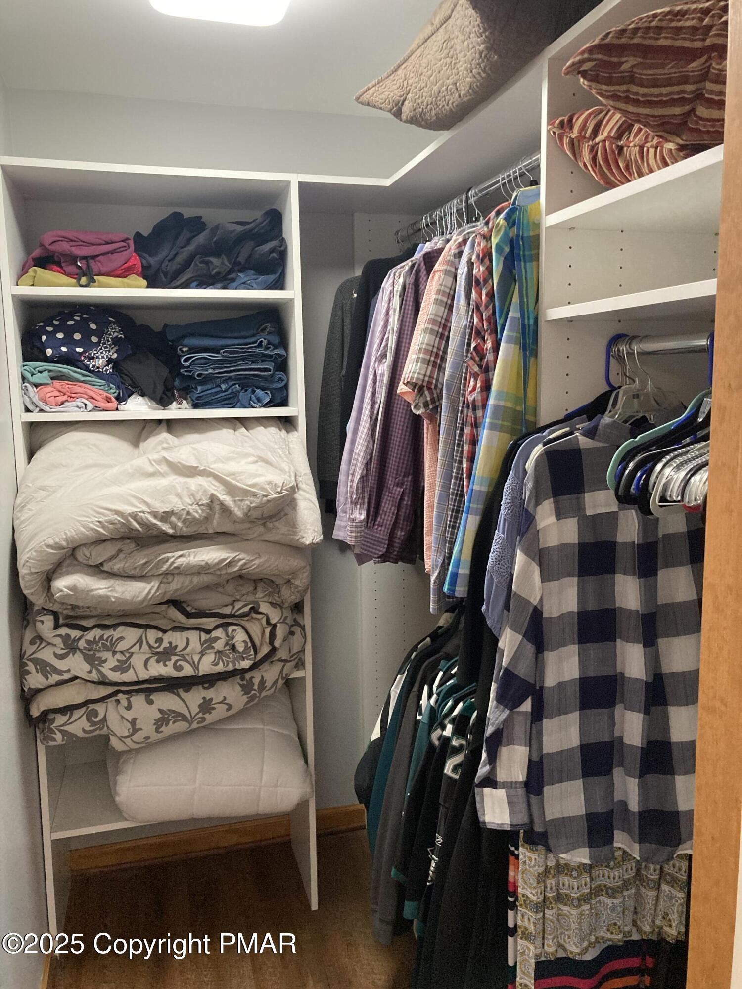 534 Sandt Road Pen Argyl, PA 18072 - Photo 58 of 77 a view of walk in closet with clothes and shoes