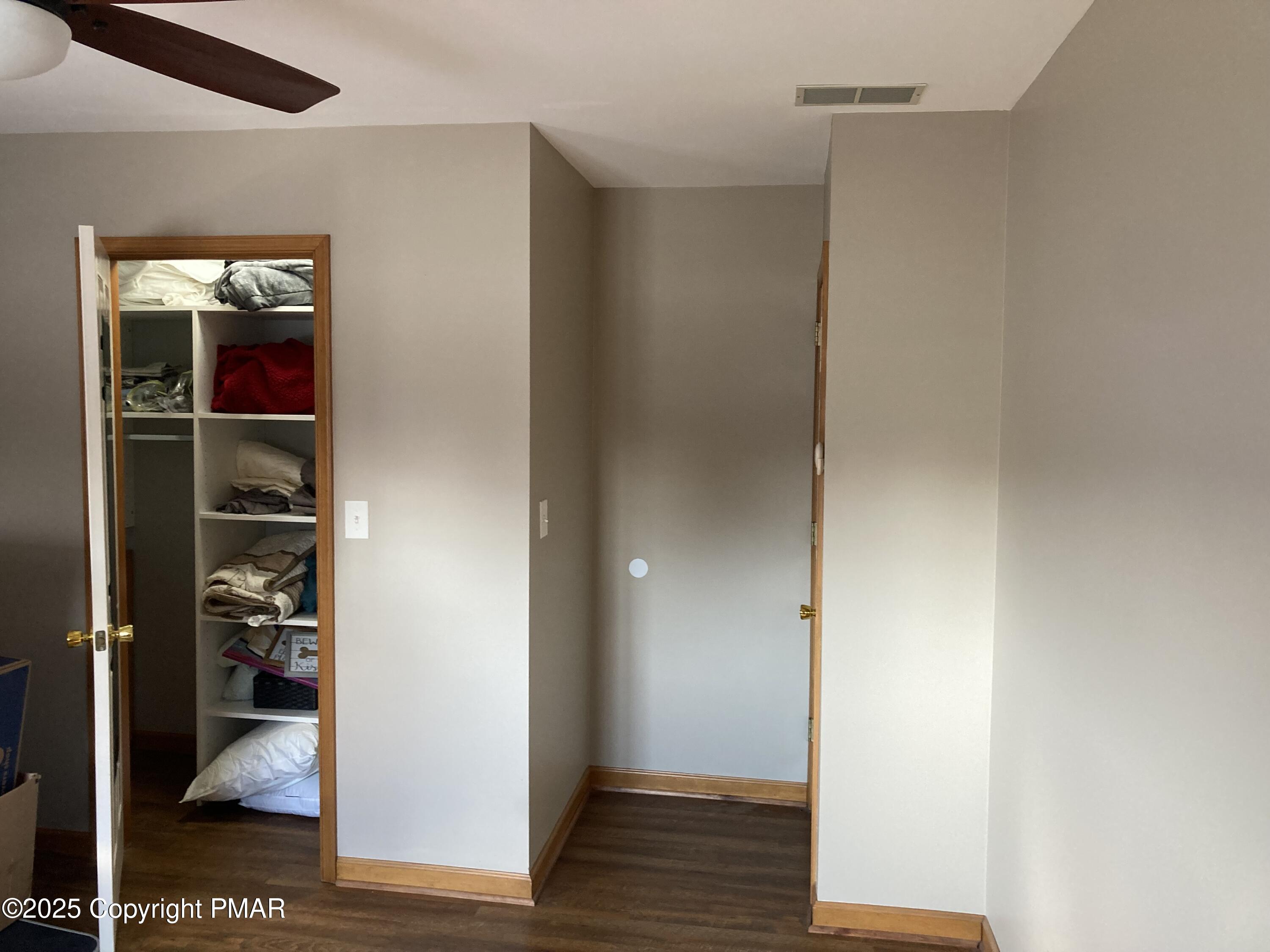 534 Sandt Road Pen Argyl, PA 18072 - Photo 60 of 77 a view of a hallway with wooden floor and closet