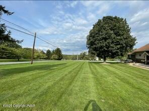 534 Sandt Road Pen Argyl, PA 18072 - Photo 9 of 77 a view of yard with swimming pool and green space