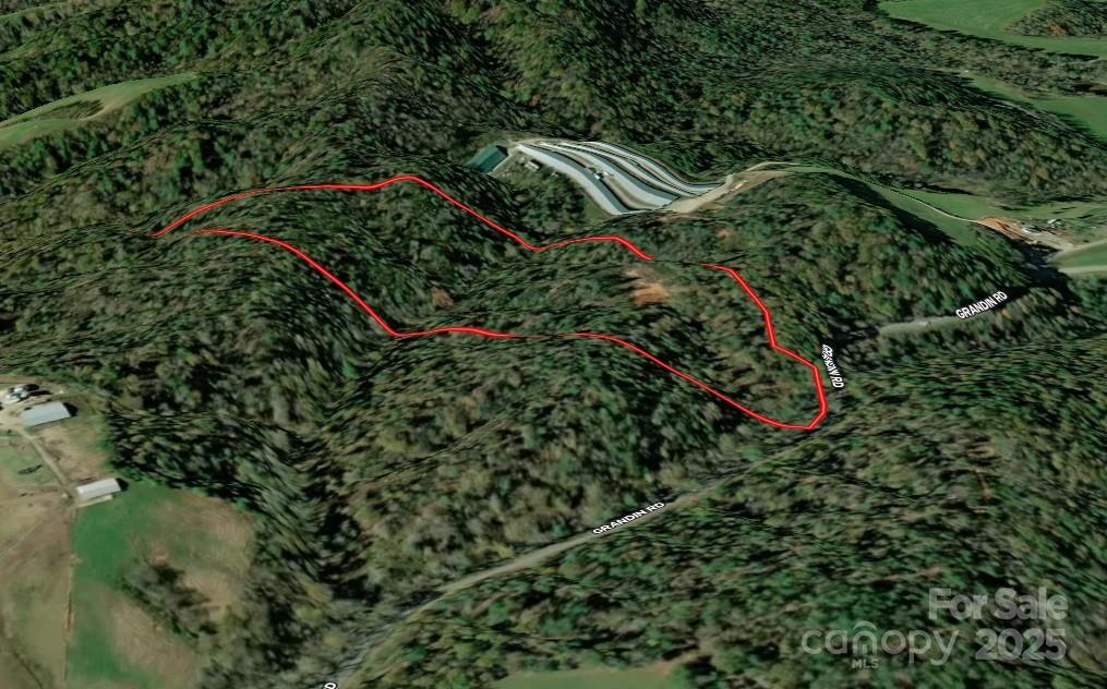 0 Grandin Road, Unit 1 Lenoir, NC 28645 - Photo 11 of 14 a view of a yard with plants and a bench