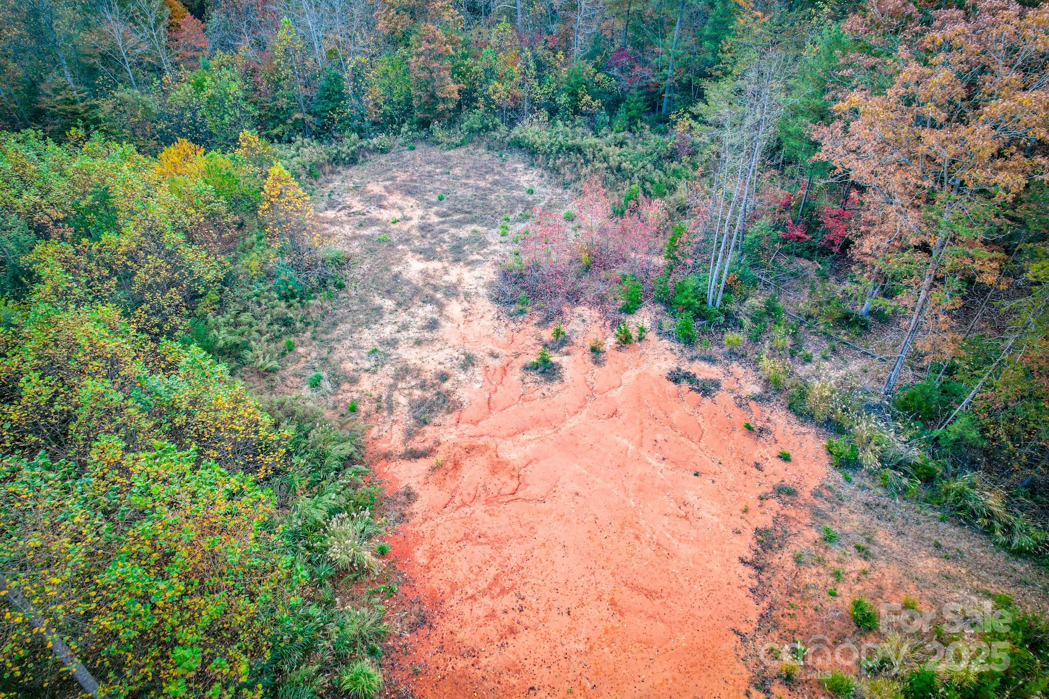 0 Grandin Road, Unit 1 Lenoir, NC 28645 - Photo 7 of 14 a backyard of a house with a yard and outdoor seating