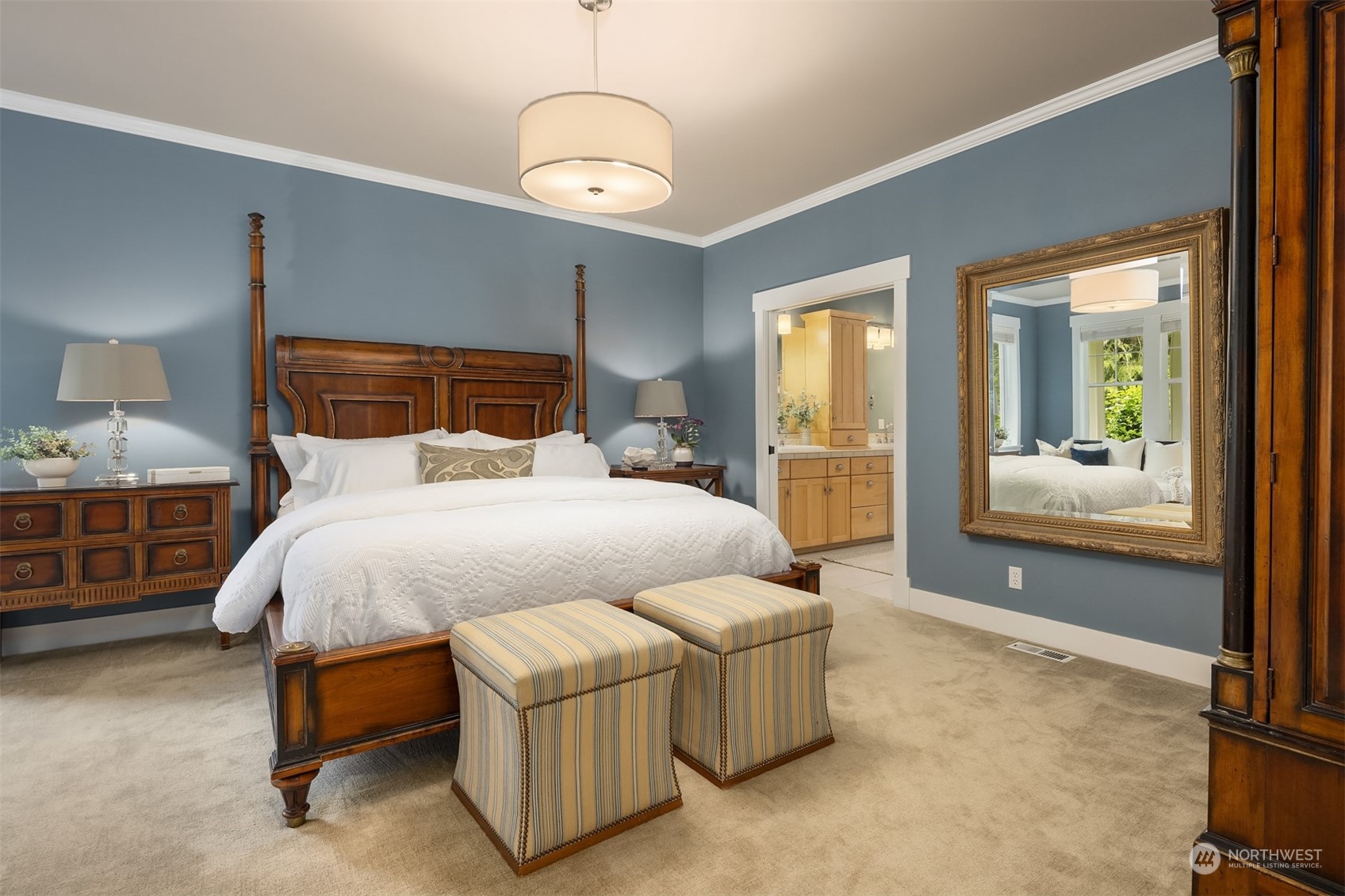 6428 Haley Loop Road Northeast Bainbridge Island, WA 98110 - Photo 12 of 40 a bed room with a bed and a night stand