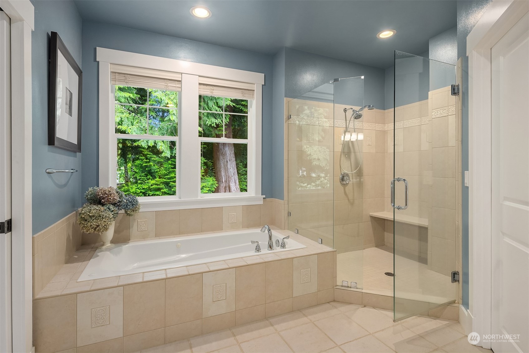 6428 Haley Loop Road Northeast Bainbridge Island, WA 98110 - Photo 15 of 40 a spacious bathroom with a bathtub and shower