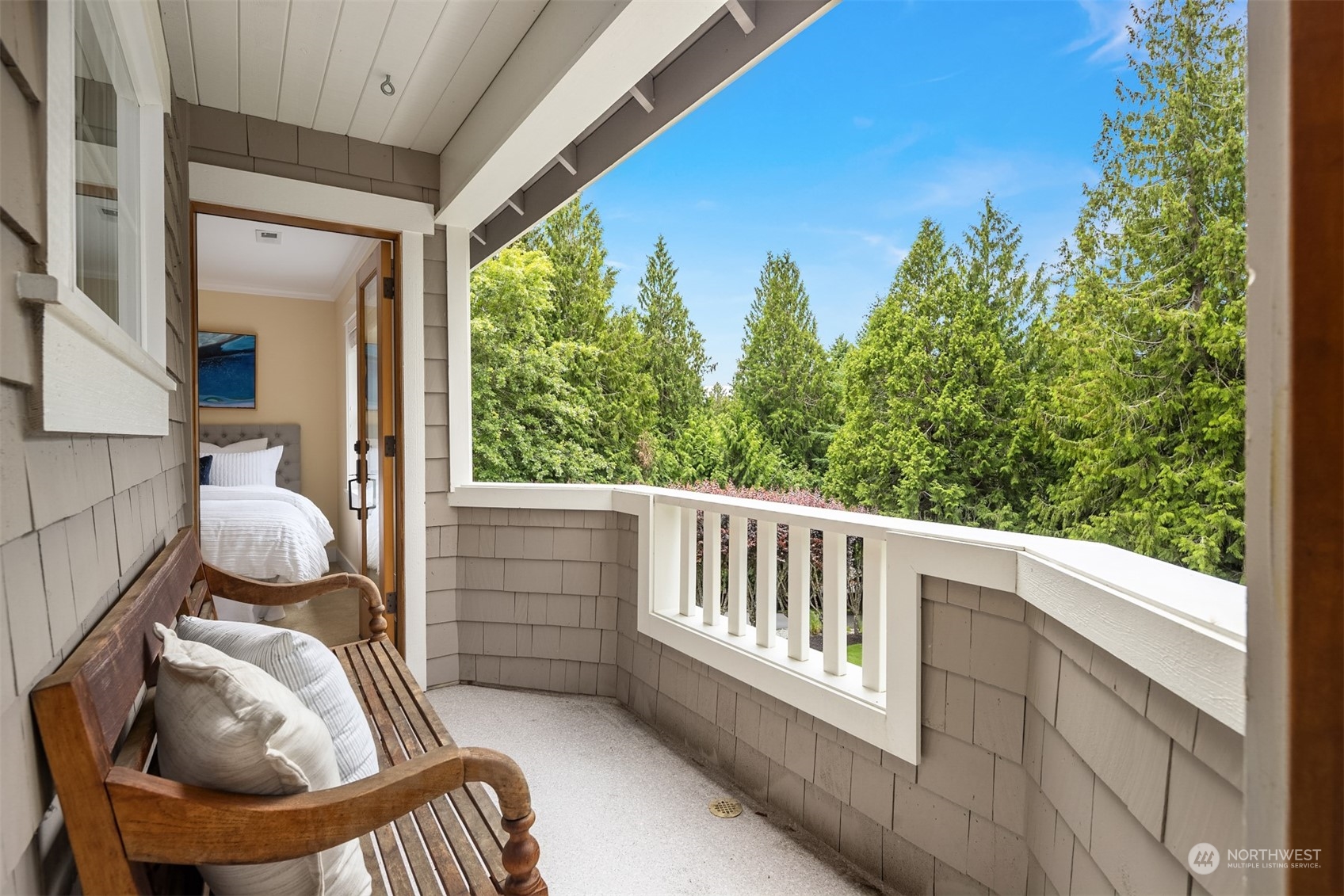 6428 Haley Loop Road Northeast Bainbridge Island, WA 98110 - Photo 20 of 40 a view of balcony with a potted plant