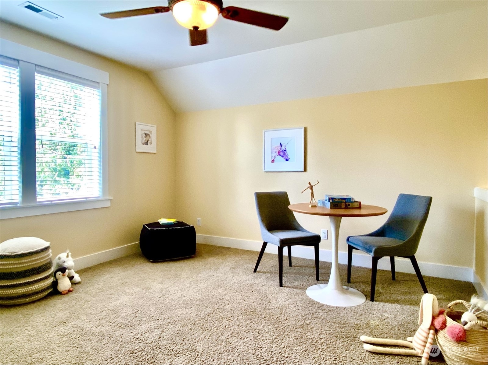 6428 Haley Loop Road Northeast Bainbridge Island, WA 98110 - Photo 28 of 40 a living room with furniture and a window