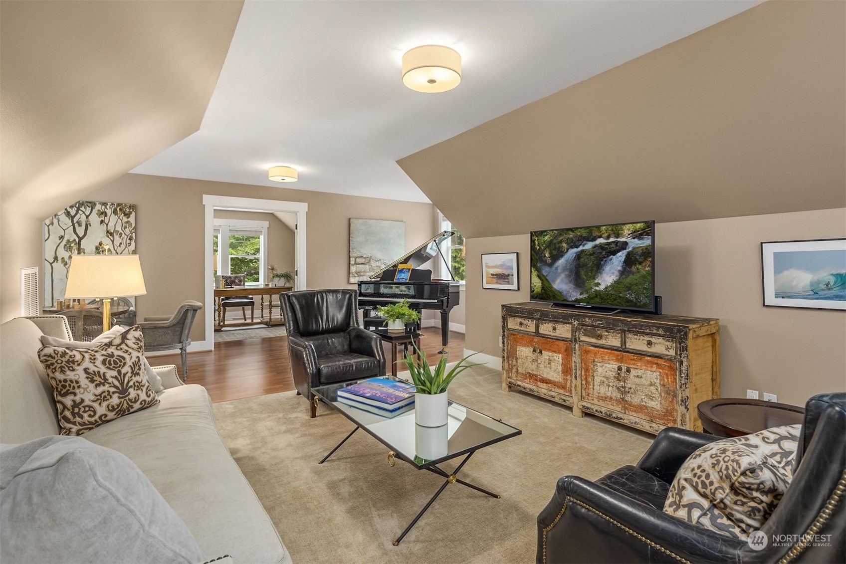 6428 Haley Loop Road Northeast Bainbridge Island, WA 98110 - Photo 29 of 40 a living room with furniture and a wooden floor