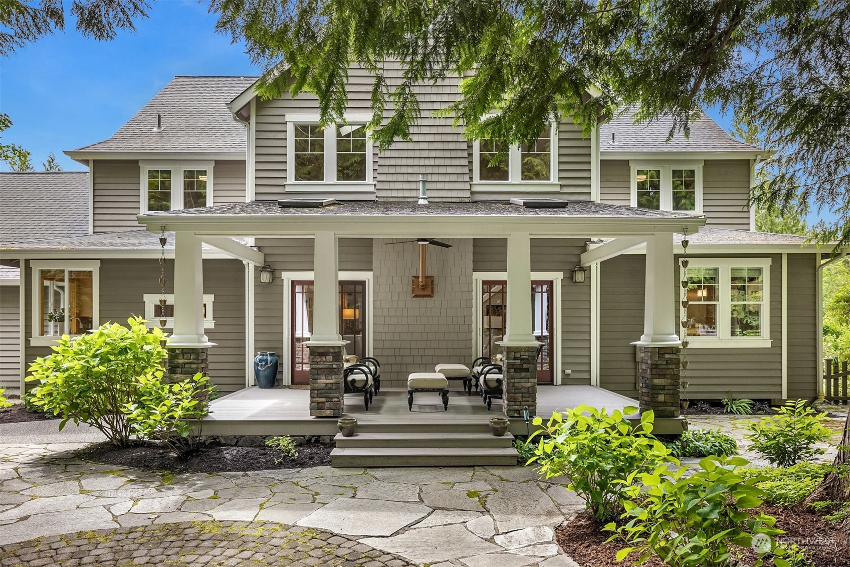 6428 Haley Loop Road Northeast Bainbridge Island, WA 98110 - Photo 32 of 40 front view of a house with a yard