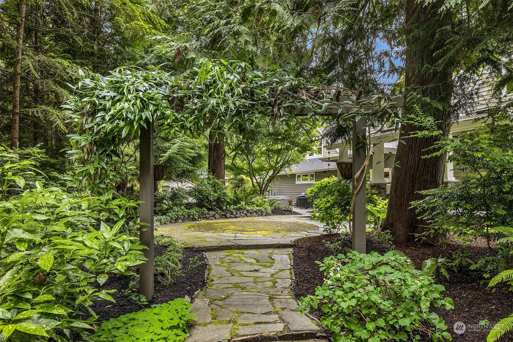6428 Haley Loop Road Northeast Bainbridge Island, WA 98110 - Photo 35 of 40 a view of statue in a garden