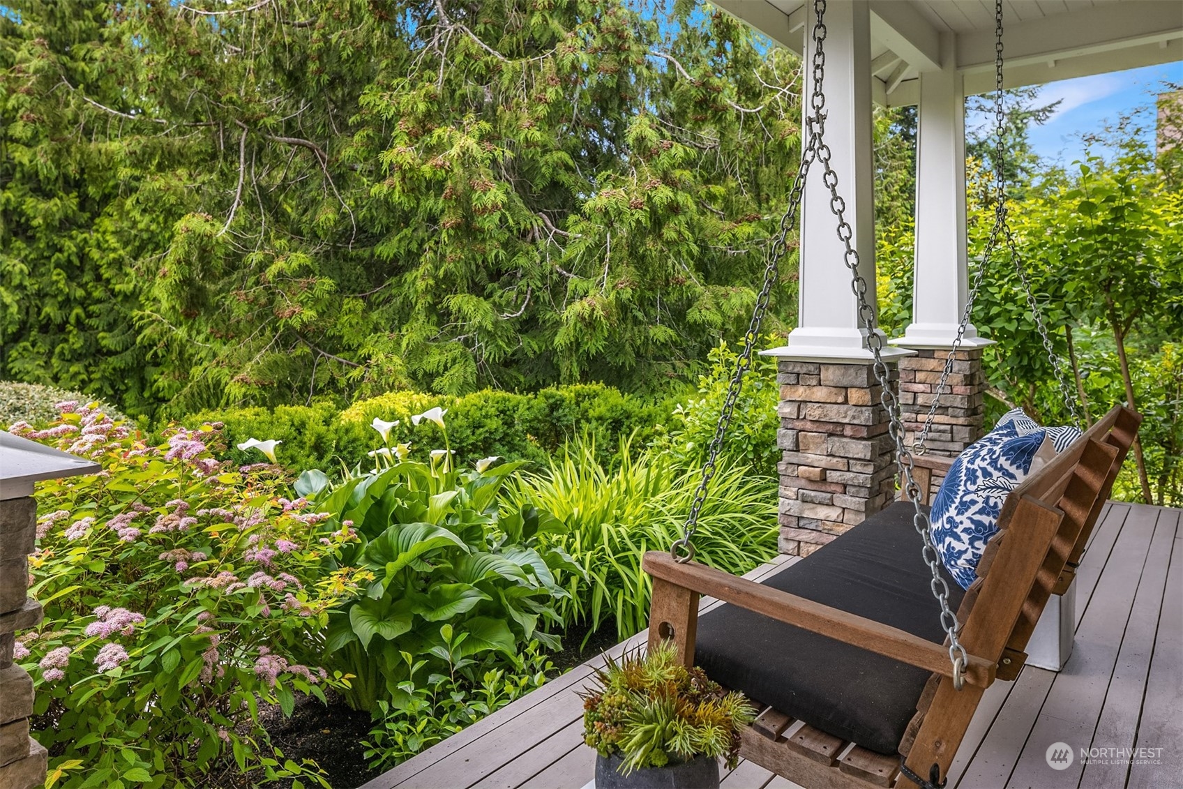 6428 Haley Loop Road Northeast Bainbridge Island, WA 98110 - Photo 39 of 40 a view of a chair and table in the patio