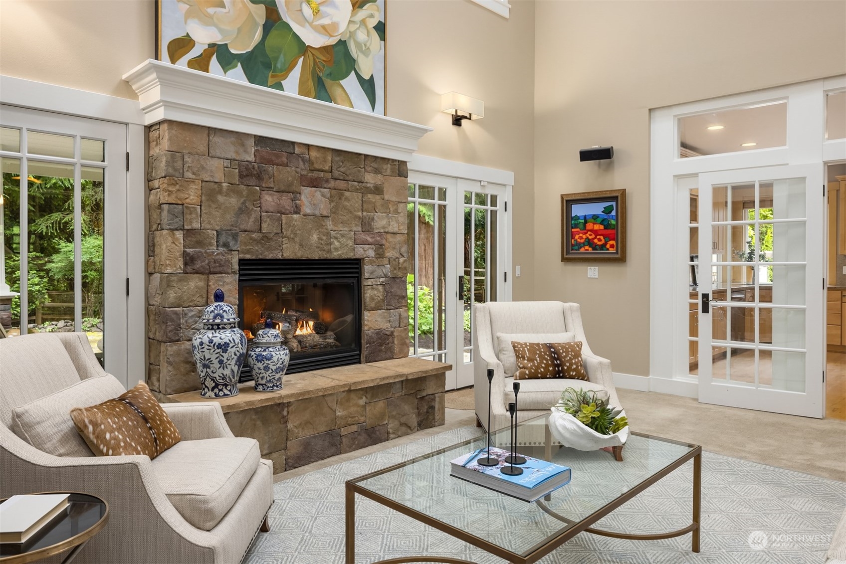 6428 Haley Loop Road Northeast Bainbridge Island, WA 98110 - Photo 10 of 40 a living room with furniture and a fireplace