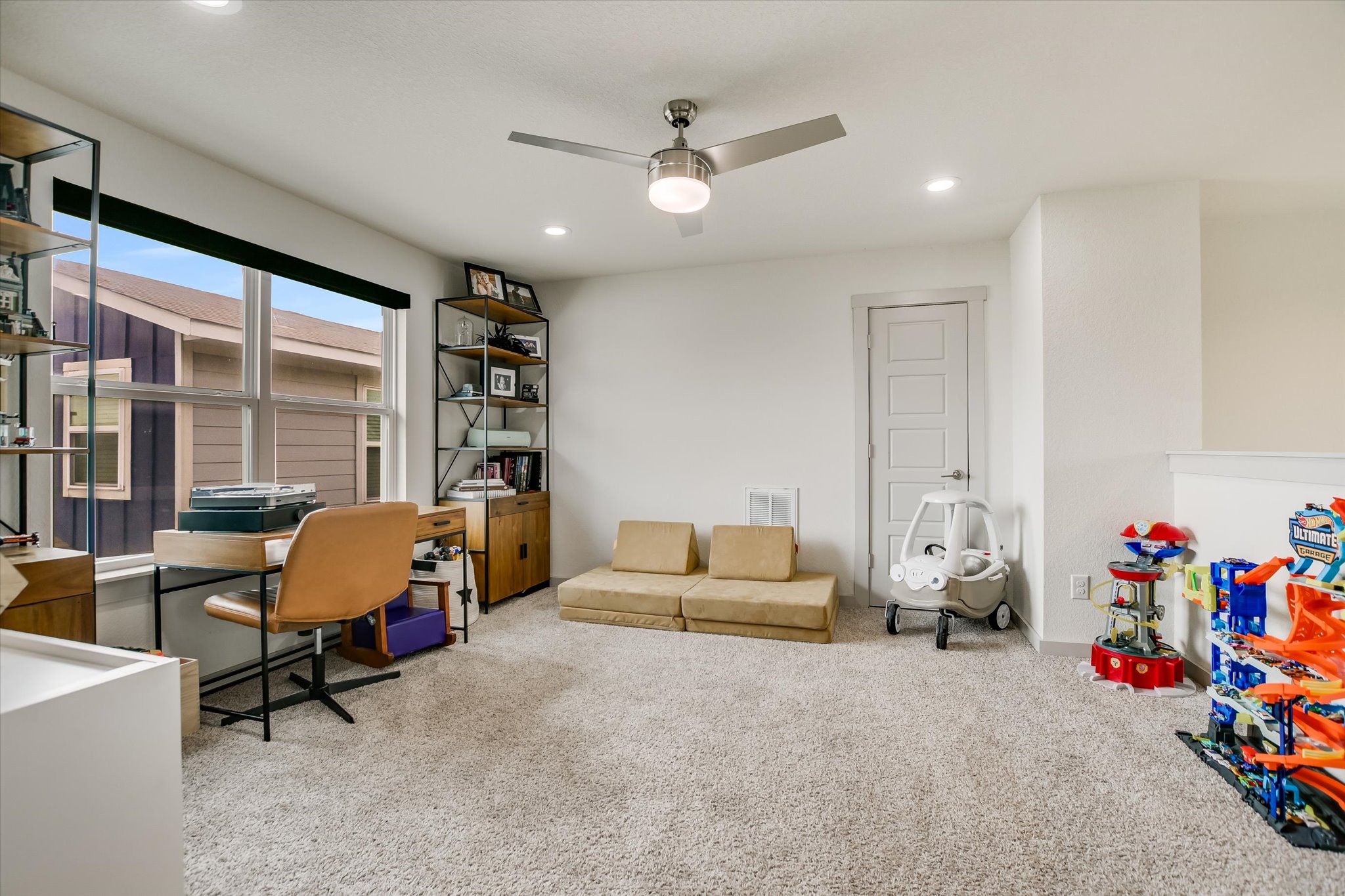117 Deserti Road Leander, TX 78641 - Photo 13 of 21 Office area with a ceiling fan, light colored carpet, and recessed lighting