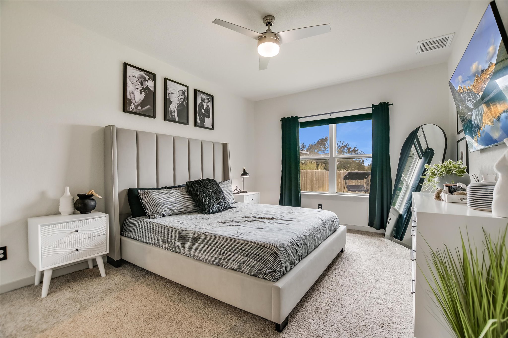 117 Deserti Road Leander, TX 78641 - Photo 10 of 21 Bedroom with a ceiling fan and light carpet
