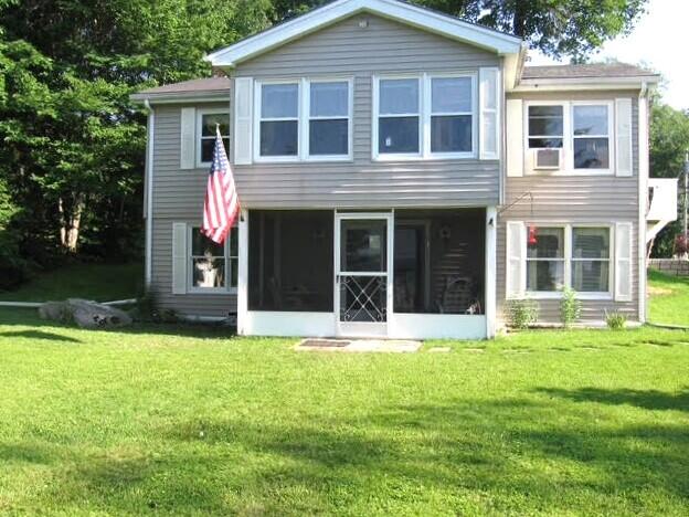 160 Pinkhams Cove Road Belgrade, ME 04917 - Photo 1 of 38 Looking up to the house from the lake