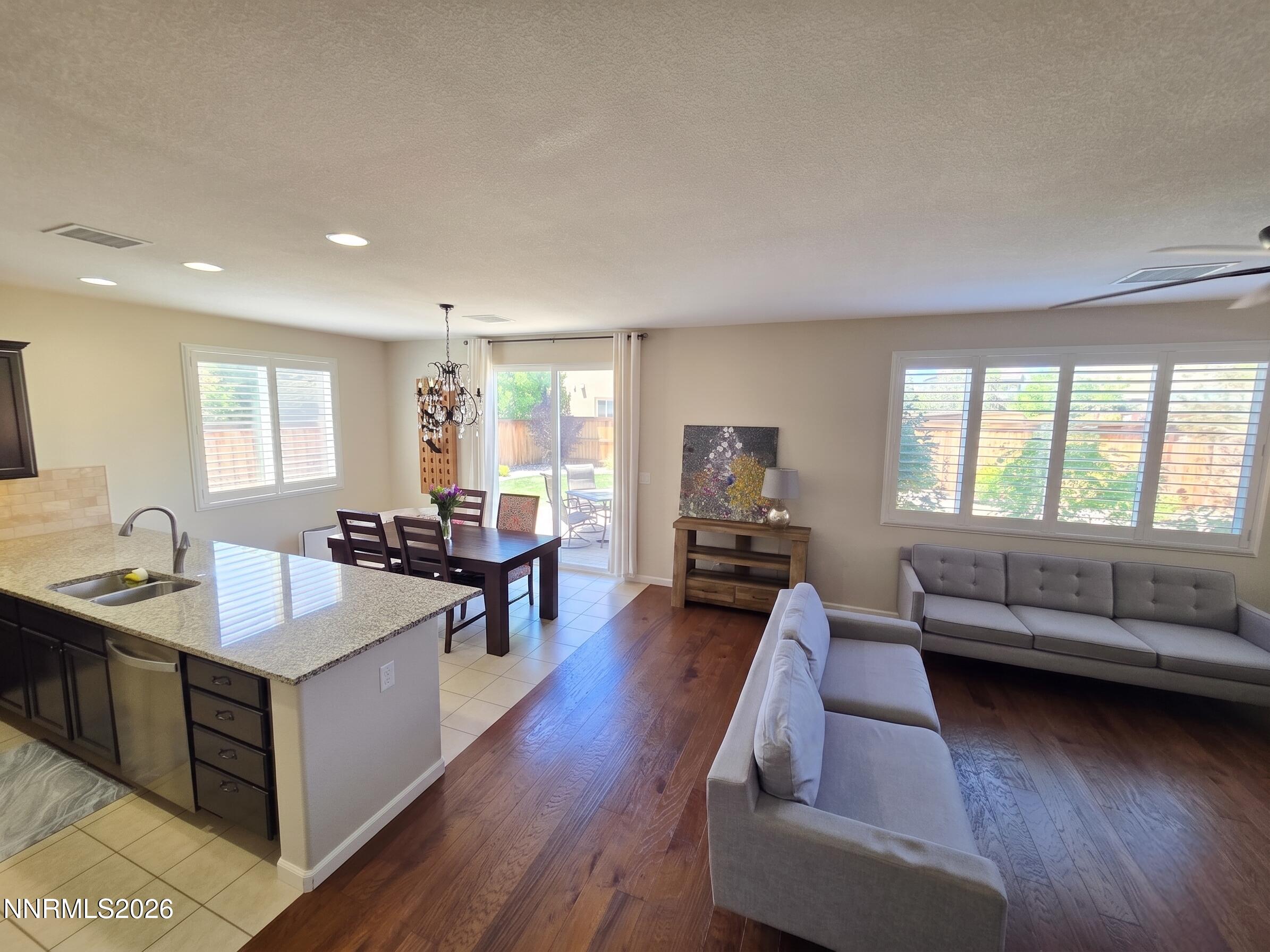 2775 Bonfire Lane Reno, NV 89521 - Photo 11 of 41 a living room with furniture and a large window