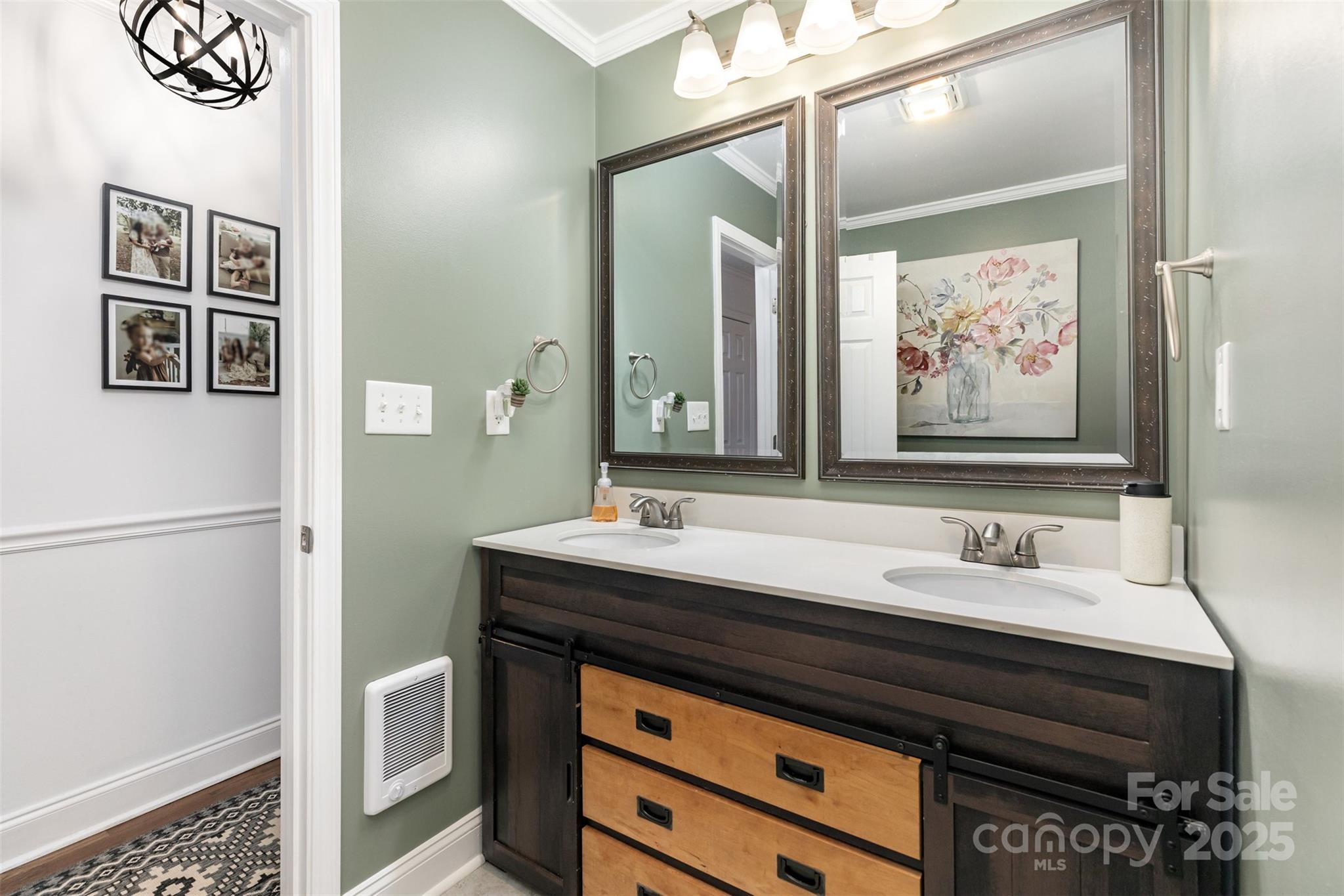 3209 Fincher Road Matthews, NC 28104 - Photo 15 of 24 a bathroom with a sink and a mirror