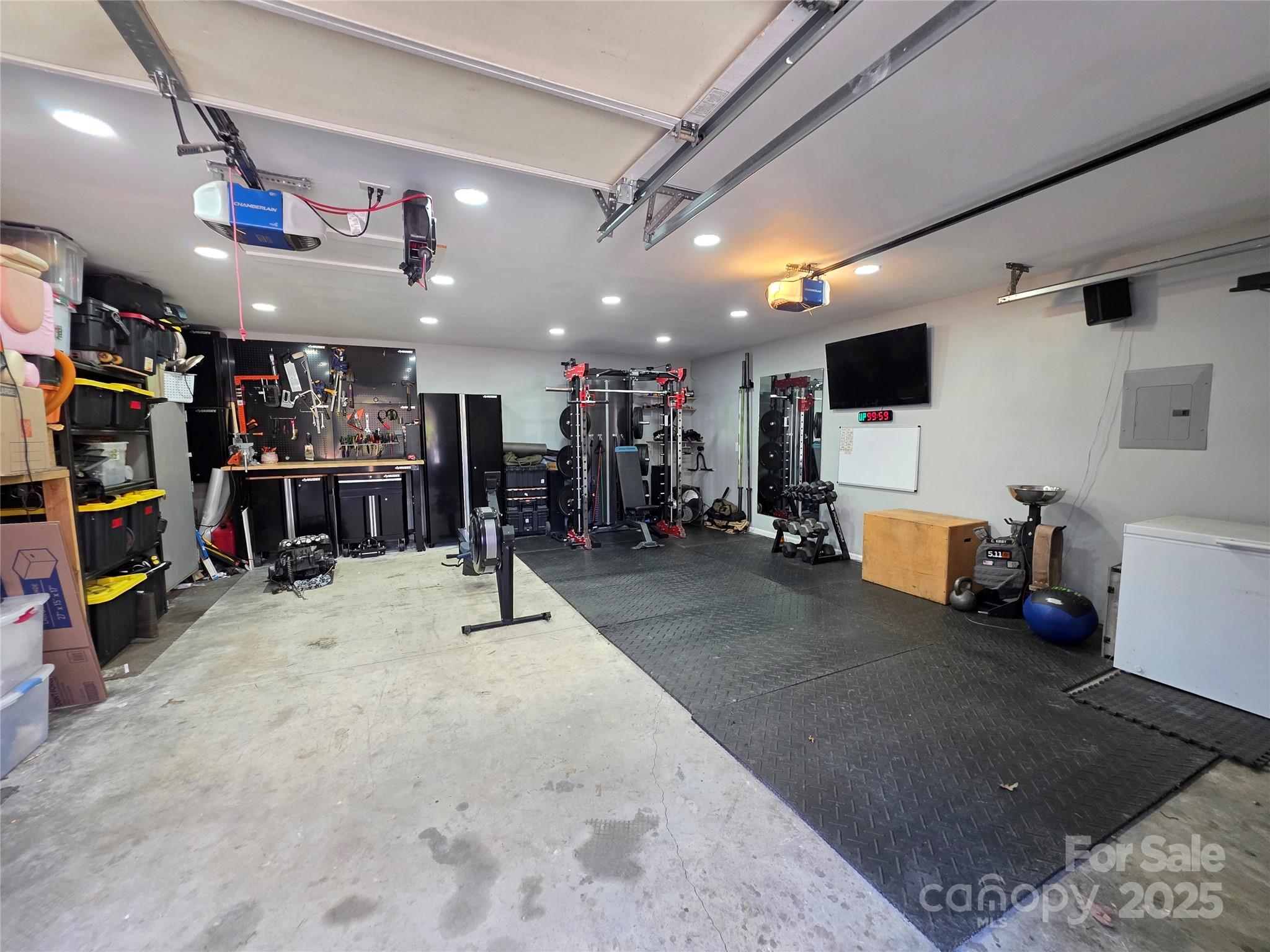 3209 Fincher Road Matthews, NC 28104 - Photo 22 of 24 a view of a room with gym equipment