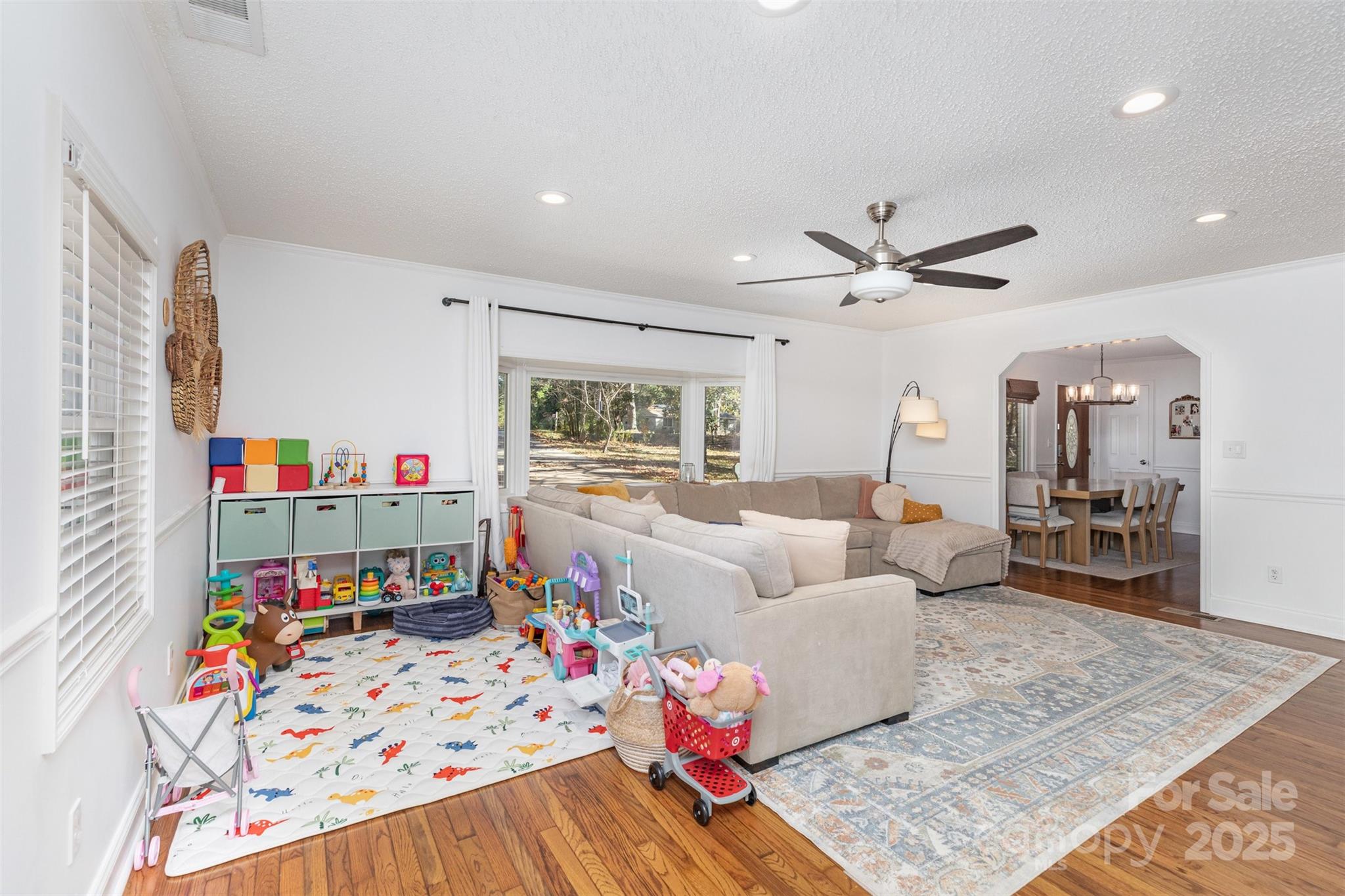 3209 Fincher Road Matthews, NC 28104 - Photo 7 of 24 a living room with furniture and a wooden floor