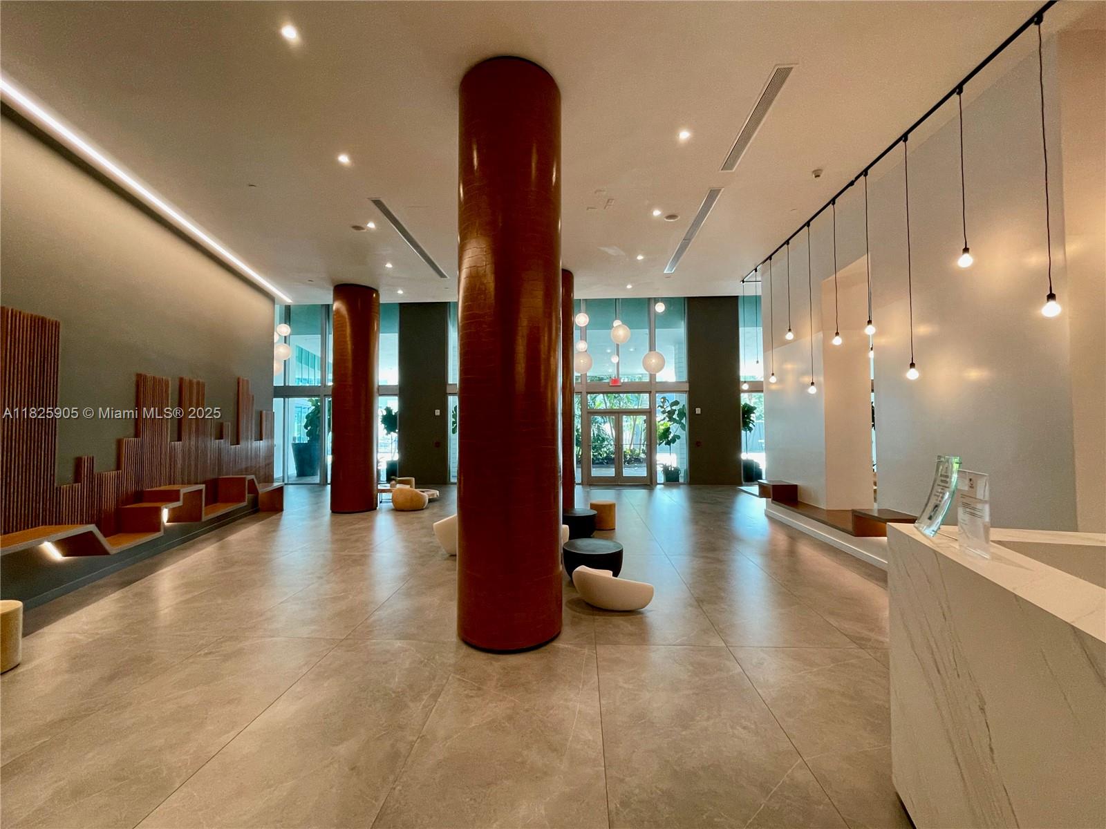 350 South Miami Avenue, Unit 1102 Miami, FL 33130 - Photo 26 of 29 a lobby with furniture and a potted plant