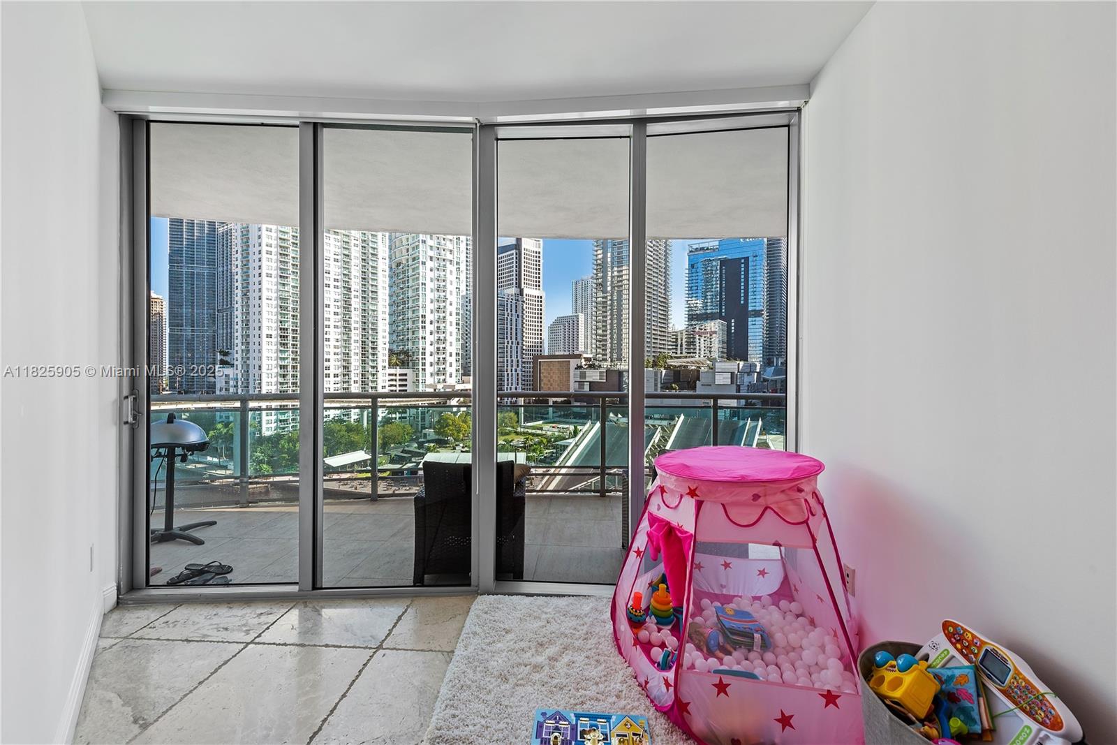 350 South Miami Avenue, Unit 1102 Miami, FL 33130 - Photo 7 of 29 a very nice looking room with a large window